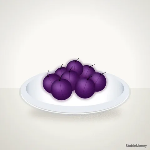 plums in a white bowl
