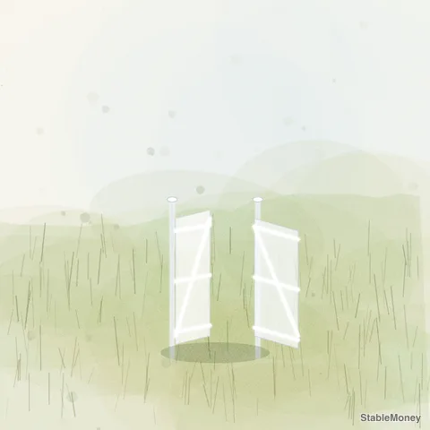 a white gate in a field